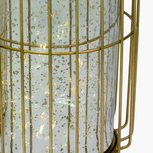 Candelabro dorado con base metálica y vidrio