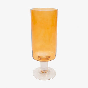 Copa decorativa en vidrio color naranja, diseño moderno para centro de mesa o repisa.