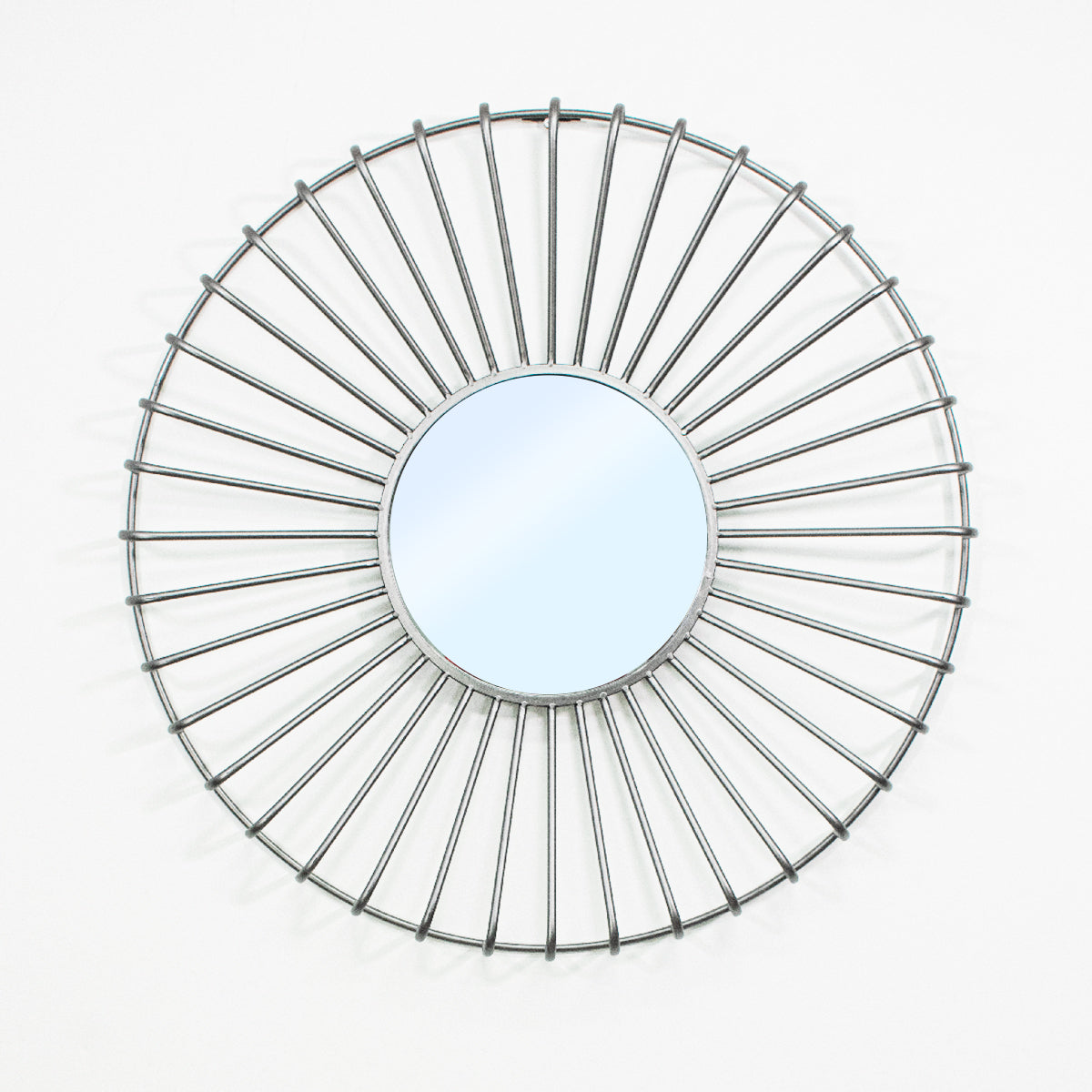 Espejo redondo decorativo color gris con marco metálico, diseño moderno tipo sol.