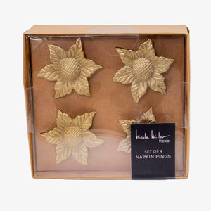 Set de servilleteros dorados en forma de girasol, diseño en metal elegante para decoración de mesa.